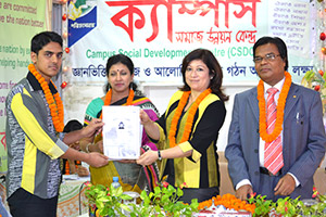 Managing Director of Microsoft Bangladesh, Sonia Bashir Kabir, is giving                      Certificates to the Trainees of Free Computer Training (Batch 131) as Chief Guest;  Dr. M Helal is presiding over. (2014)